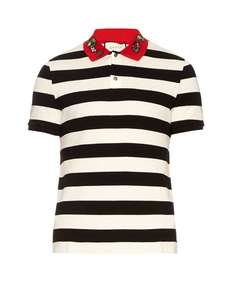 polo gucci nera serpente|T.